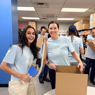 American Securities colleagues volunteering at the West Side Campaign Against Hunger (WSCAH) packing up boxes