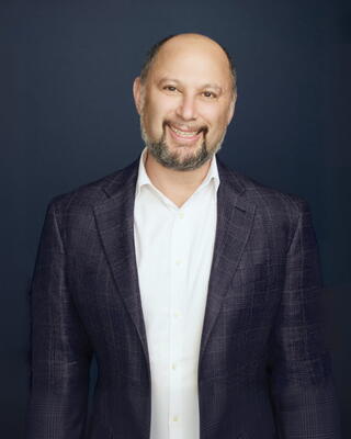 Scott Wolff, President and Partner at American Securities